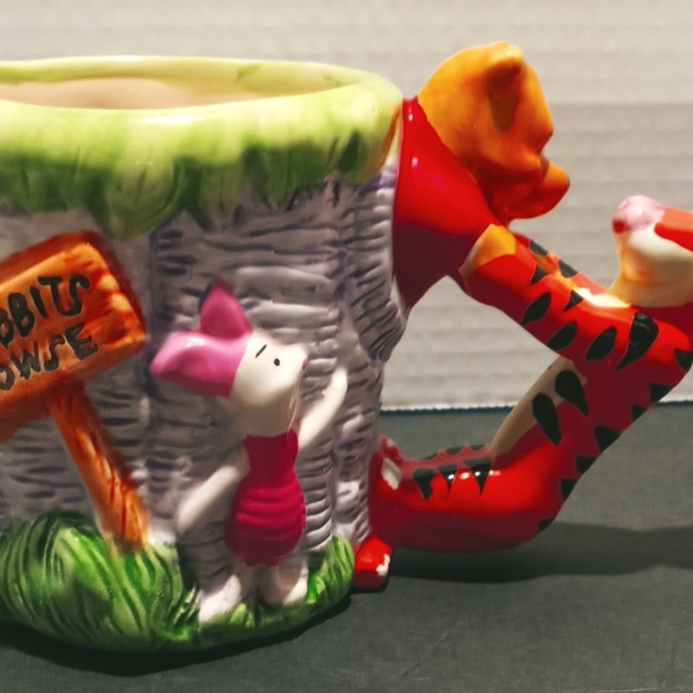 Winnie the Pooh figural ceramic coffee mug 12oz 3 3/4" tall 7" wide.